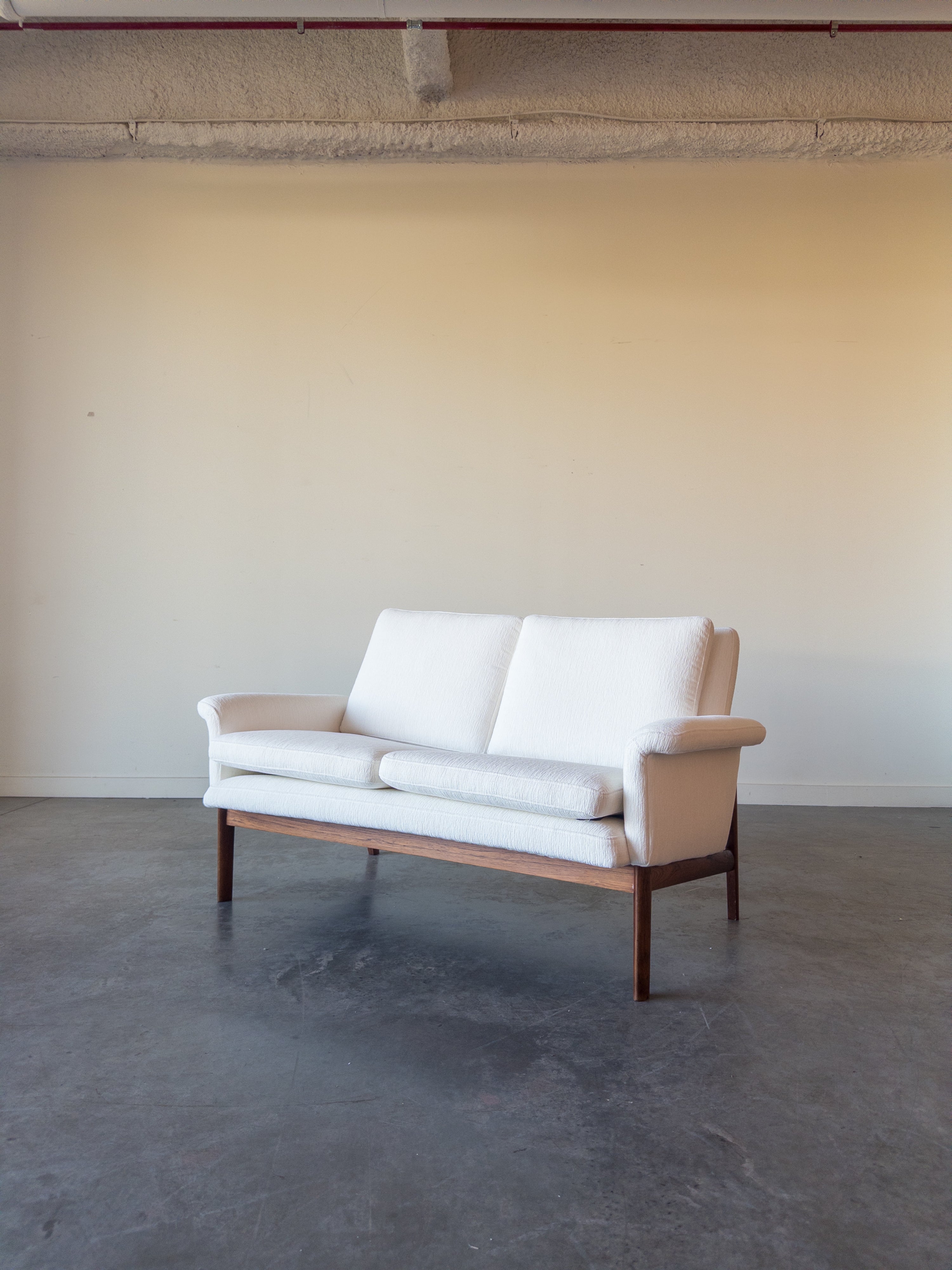 Jupiter sofa model 218 designed by Finn Juhl for France and Son.