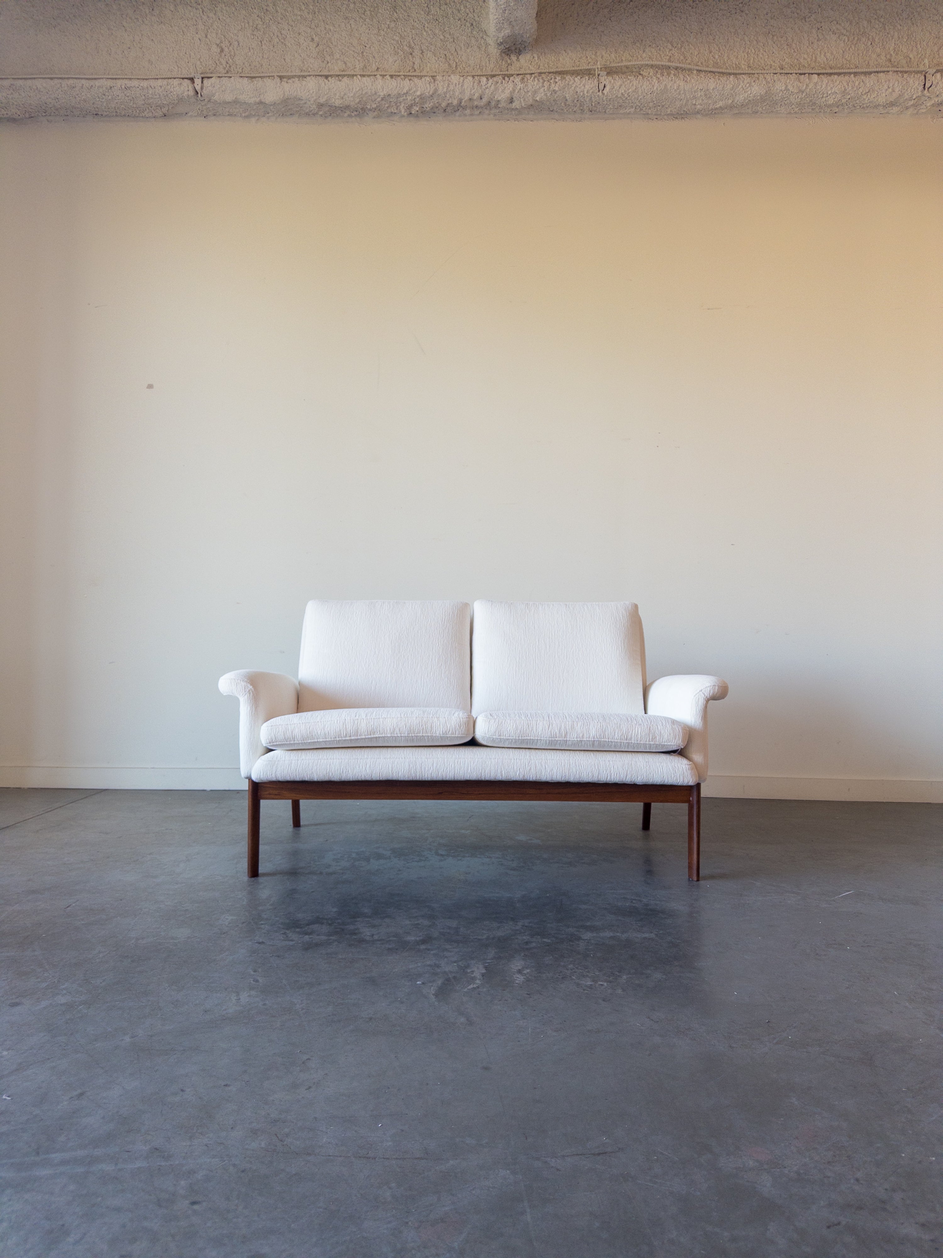 Jupiter sofa model 218 designed by Finn Juhl for France and Son.