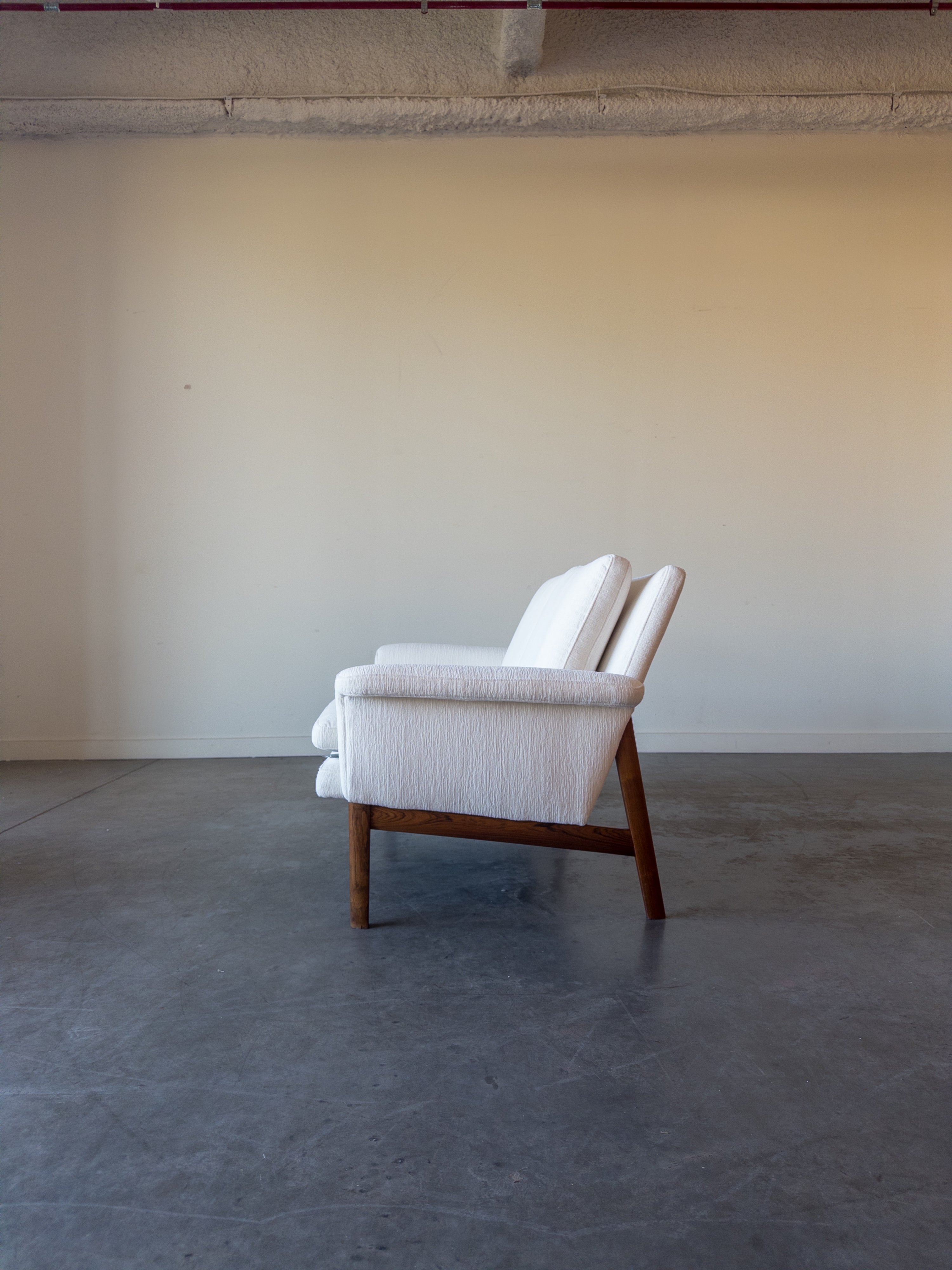 Jupiter sofa model 218 designed by Finn Juhl for France and Son.