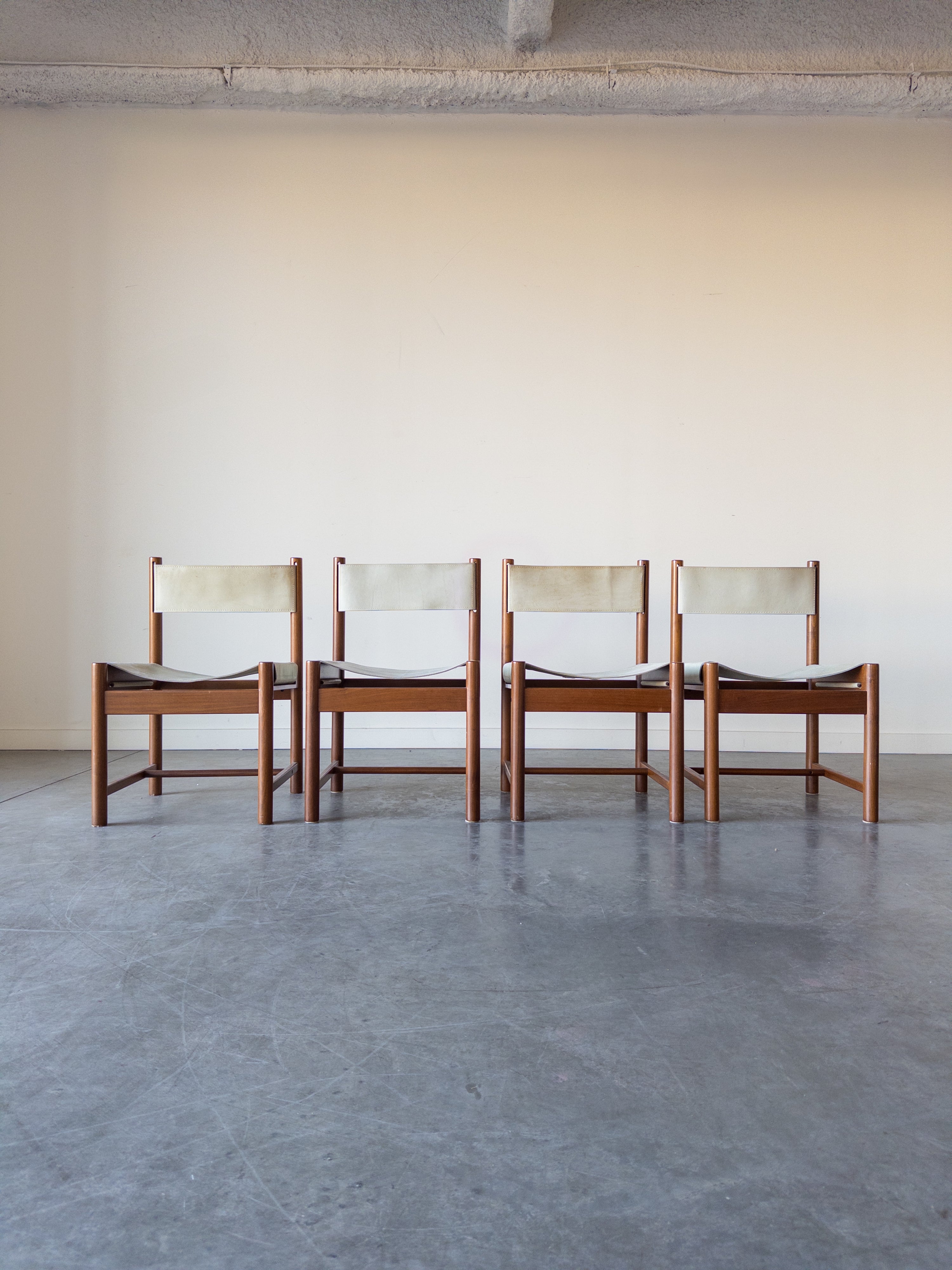 Set of 4 Imbuia Wood and Leather Sling Chairs by Michel Arnoult