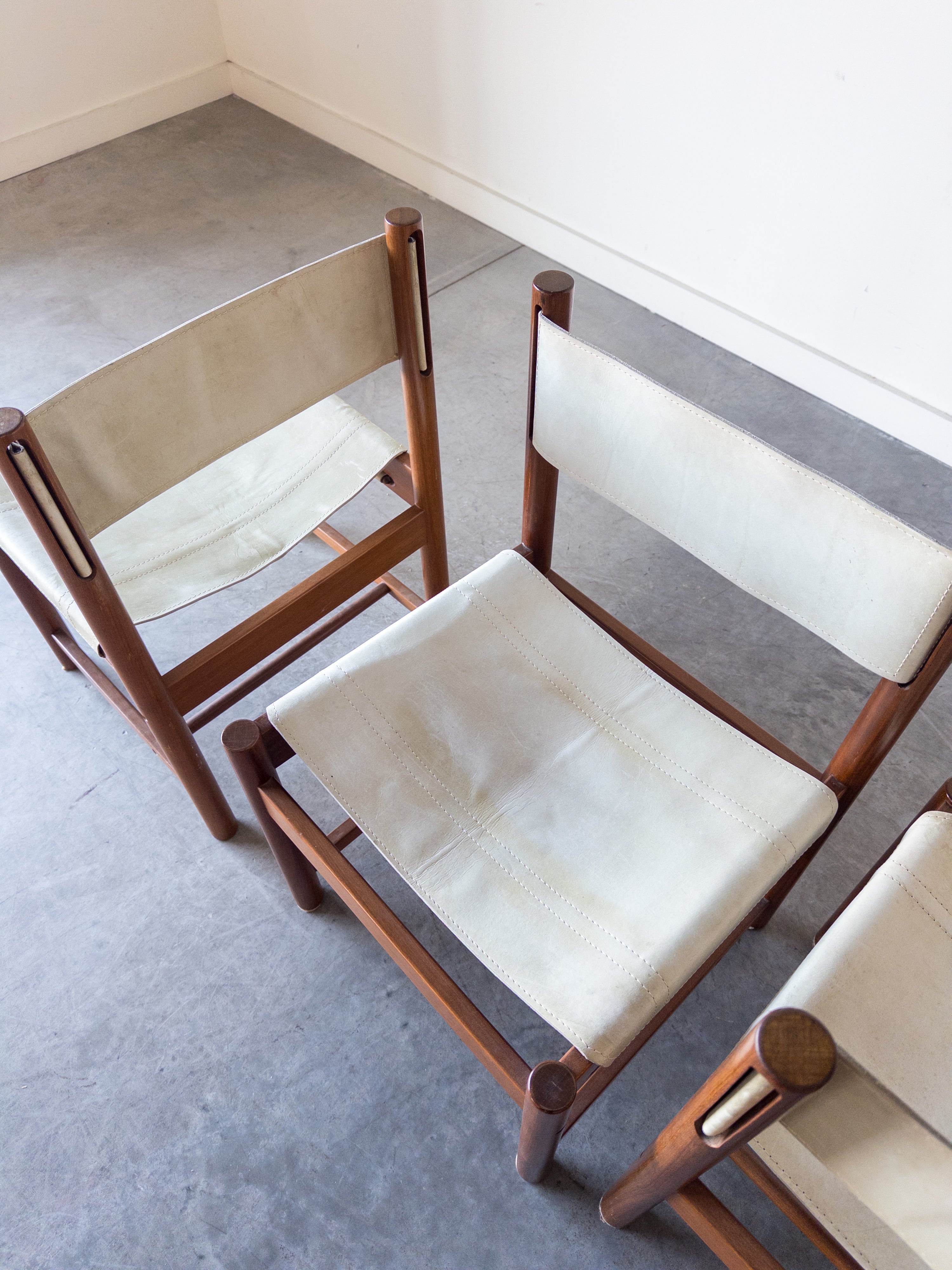 Set of 4 Imbuia Wood and Leather Sling Chairs by Michel Arnoult