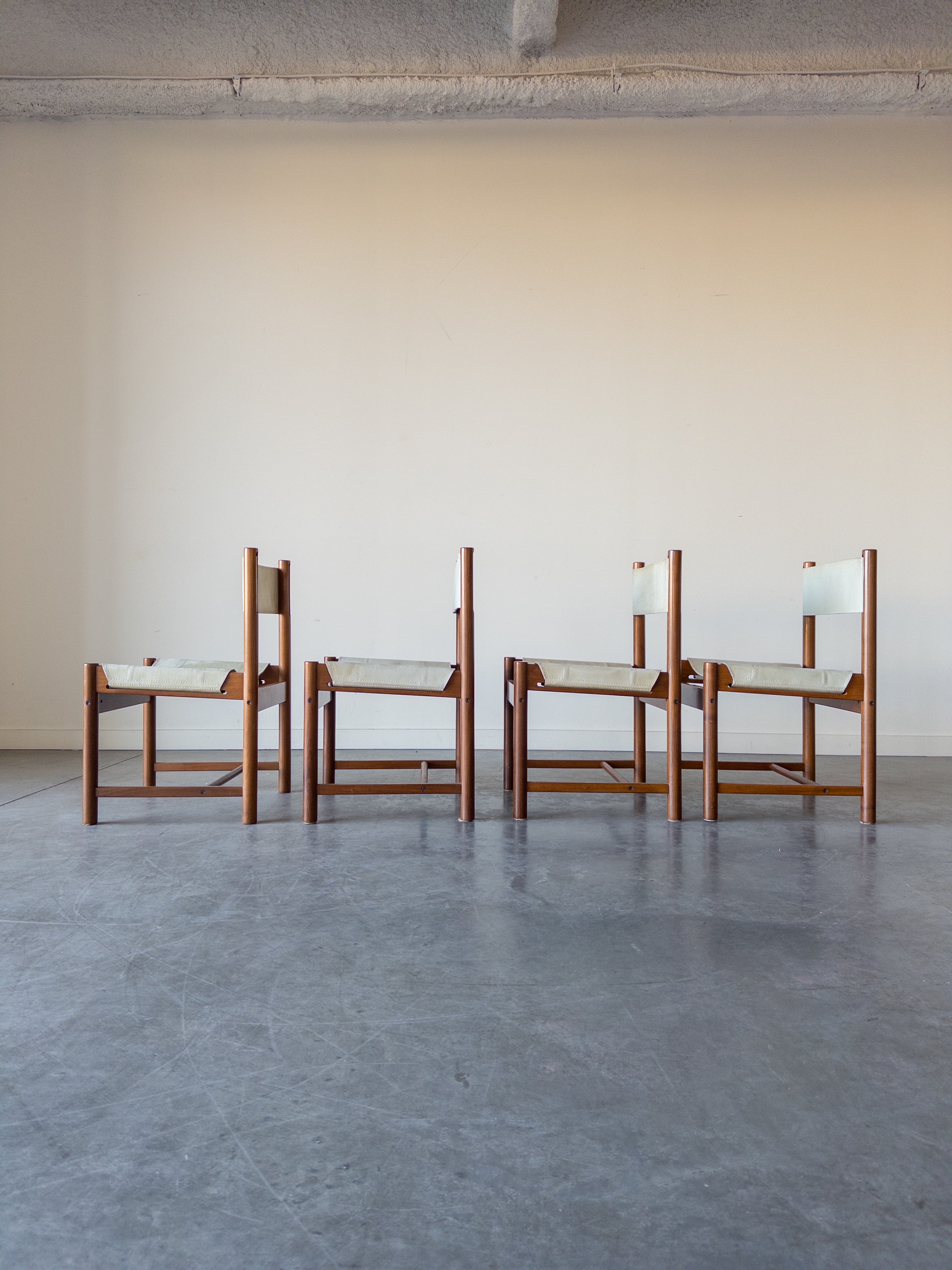 Set of 4 Imbuia Wood and Leather Sling Chairs by Michel Arnoult