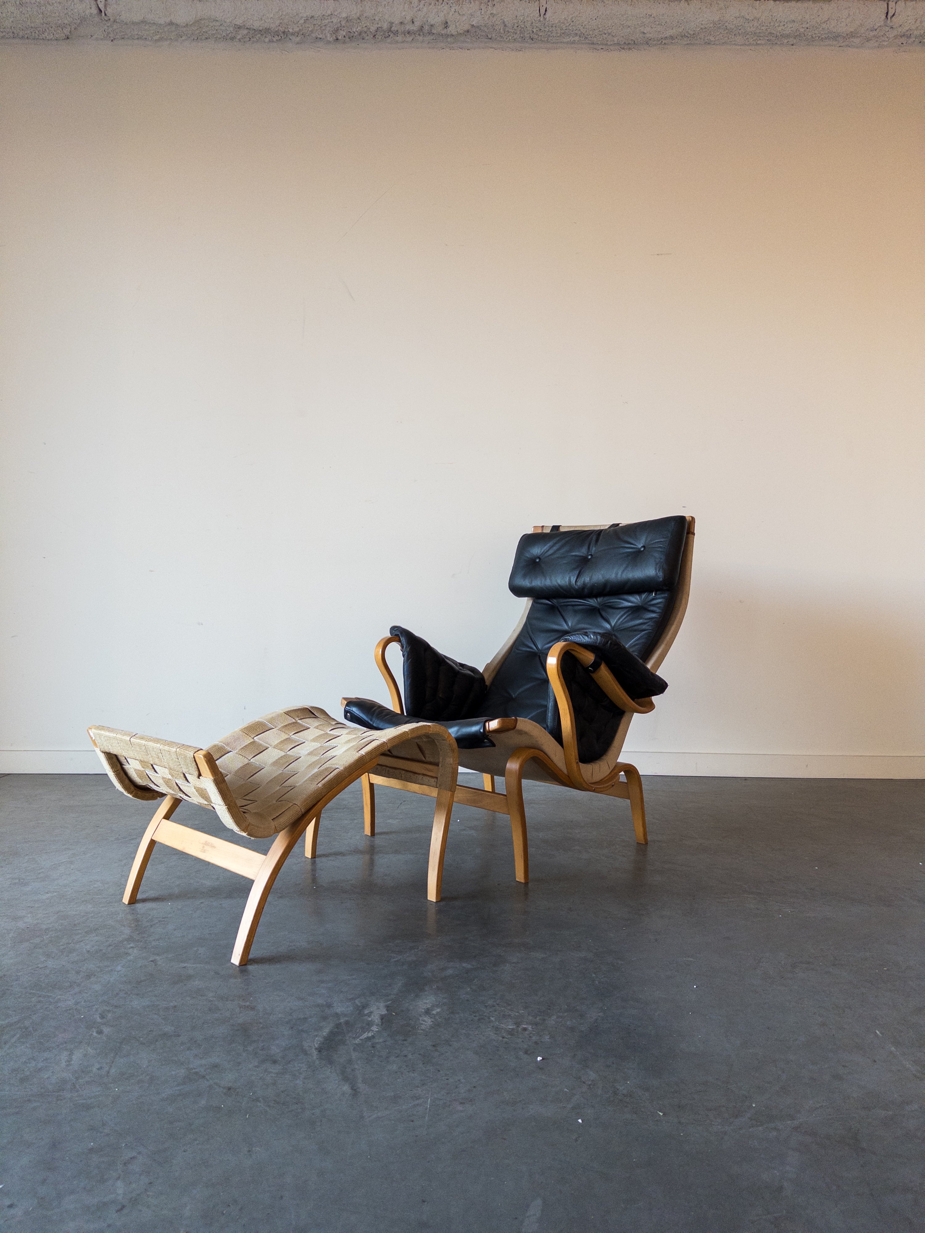 Pernilla 69 Leather Lounge Chair and Ottoman by Bruno Mathsson for DUX