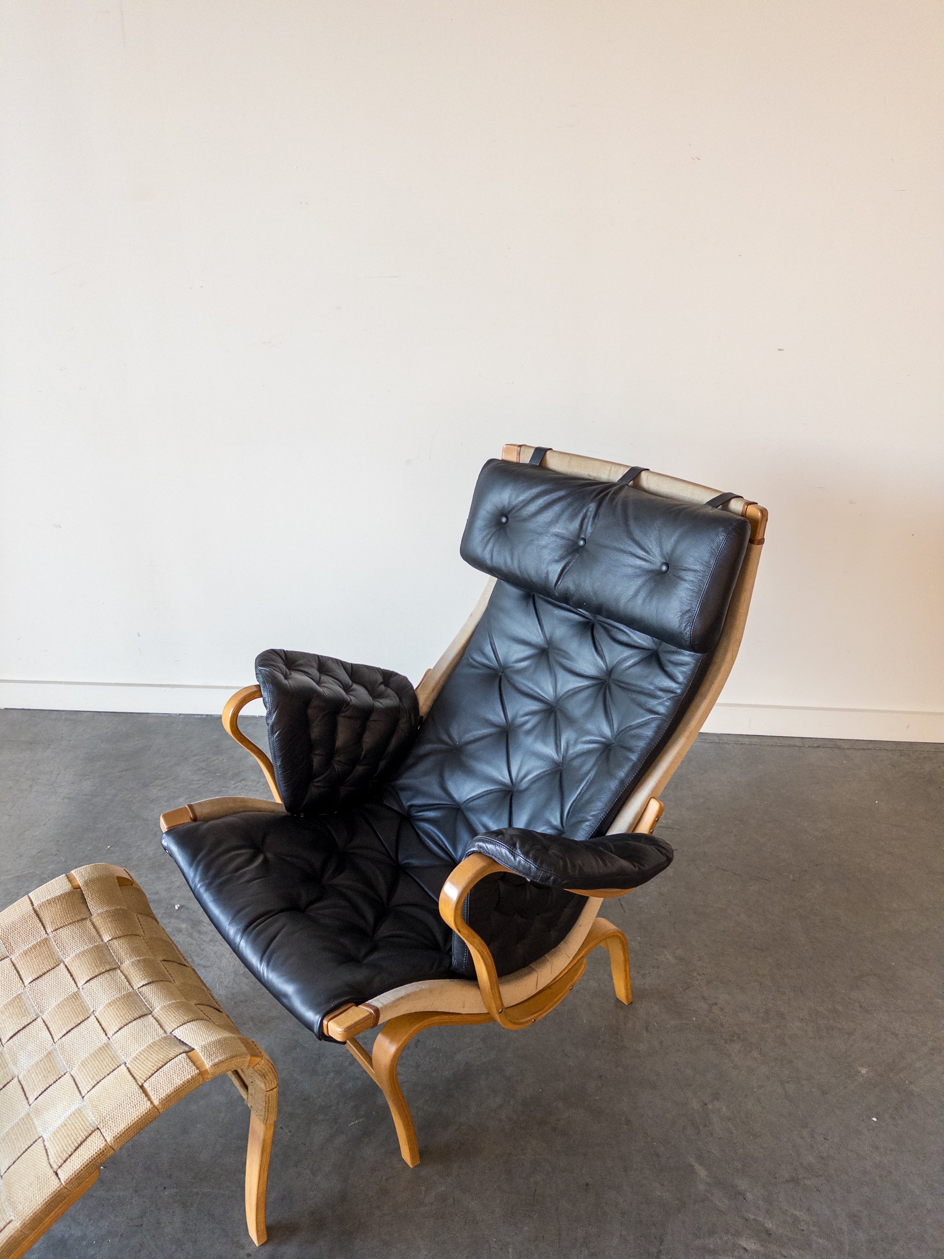 Pernilla 69 Leather Lounge Chair and Ottoman by Bruno Mathsson for DUX