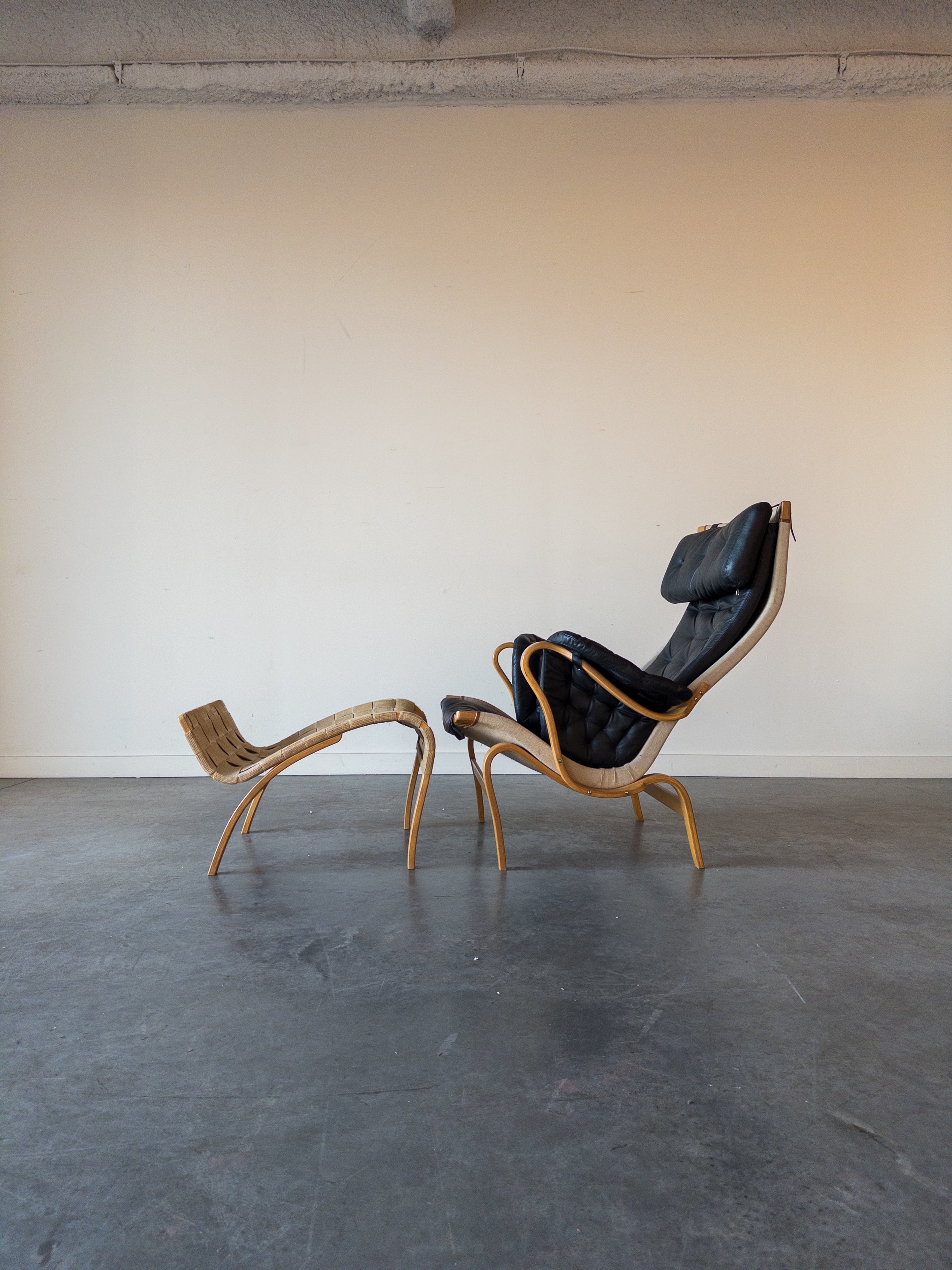 Pernilla 69 Leather Lounge Chair and Ottoman by Bruno Mathsson for DUX