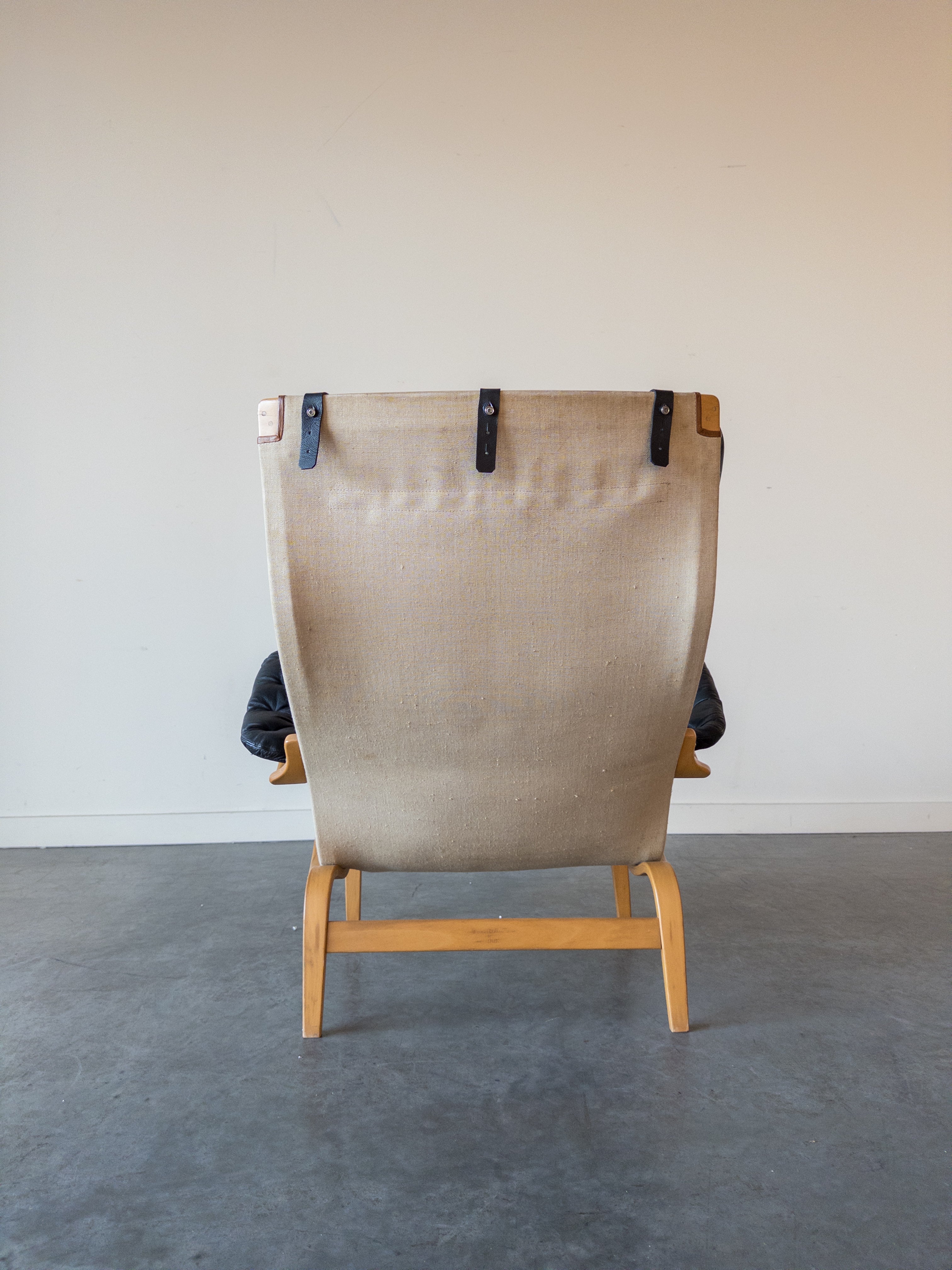 Pernilla 69 Leather Lounge Chair and Ottoman by Bruno Mathsson for