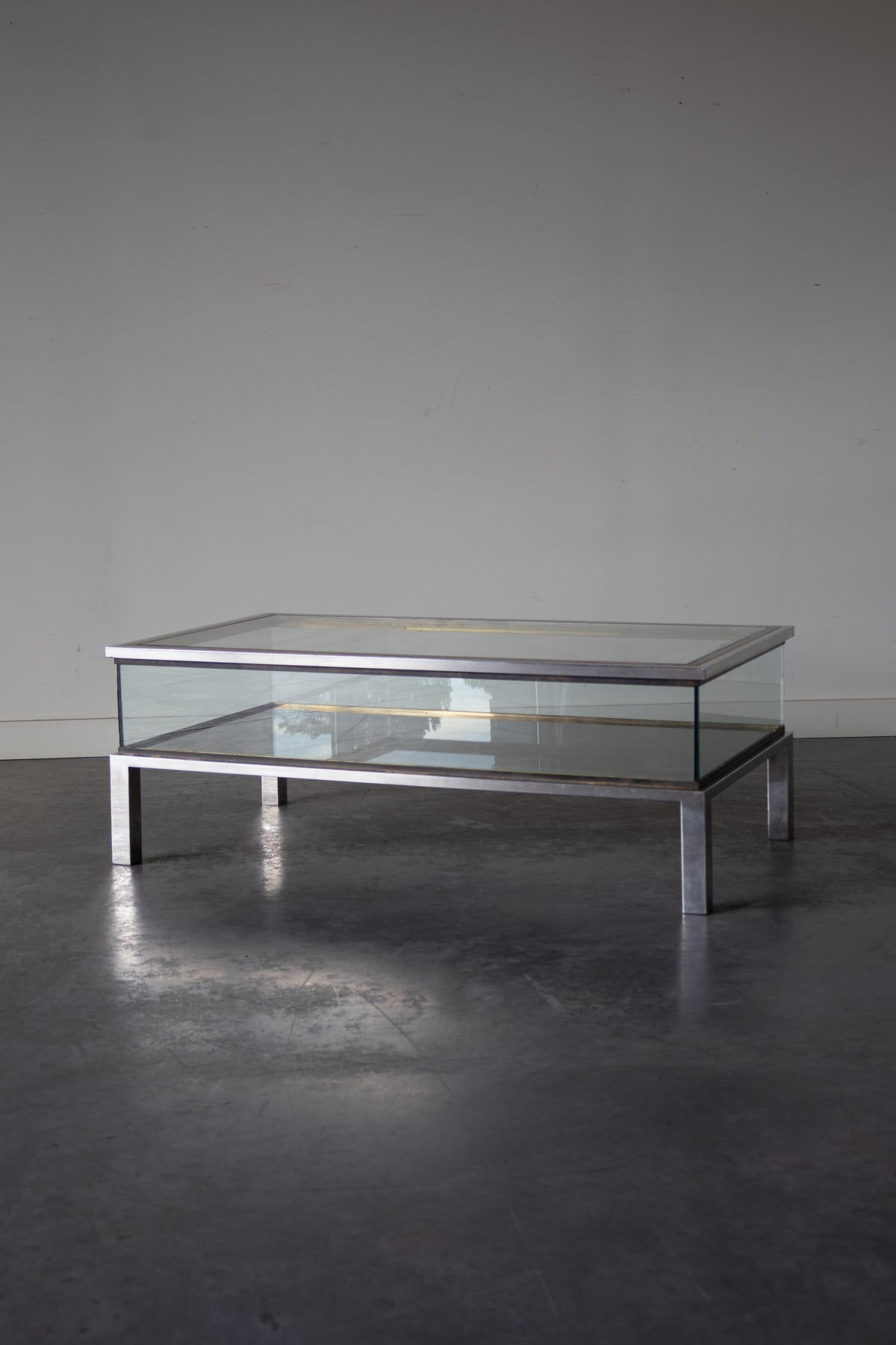 Brass and Chrome Sliding Top Coffee Table in by Maison Jansen