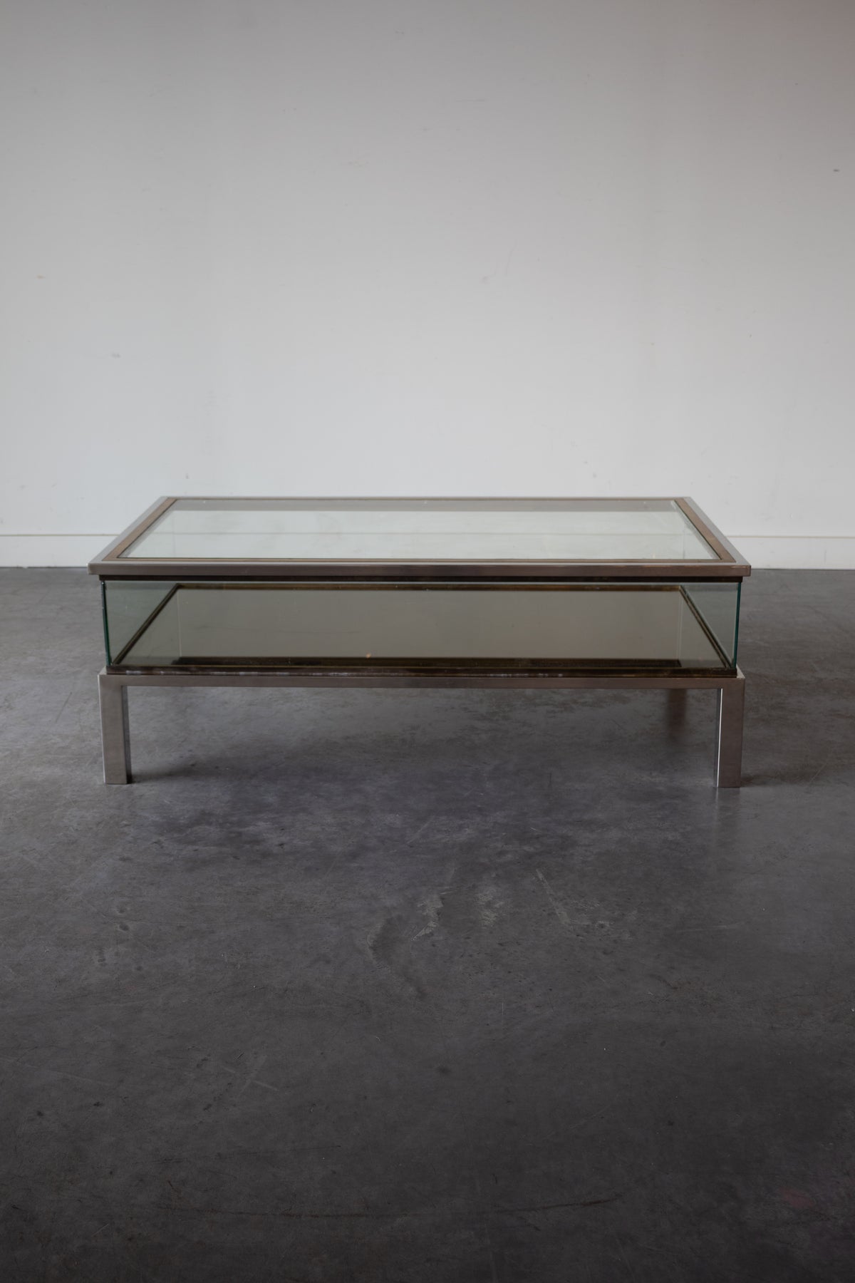 Brass and Chrome Sliding Top Coffee Table in by Maison Jansen