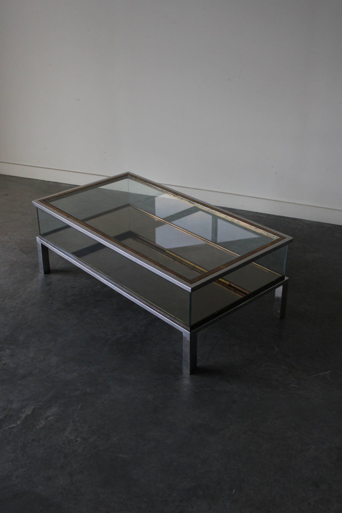 Brass and Chrome Sliding Top Coffee Table in by Maison Jansen