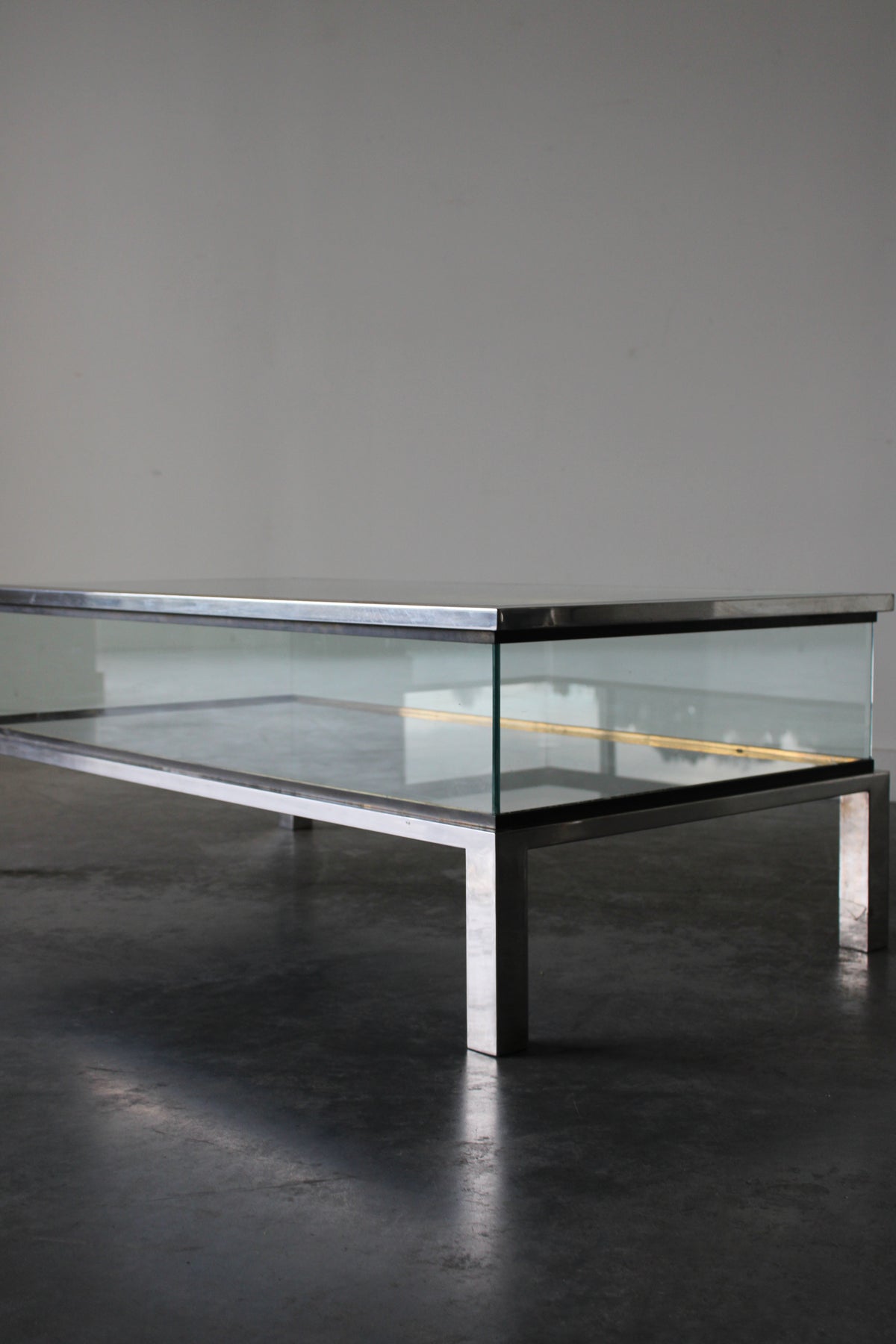 Brass and Chrome Sliding Top Coffee Table in by Maison Jansen
