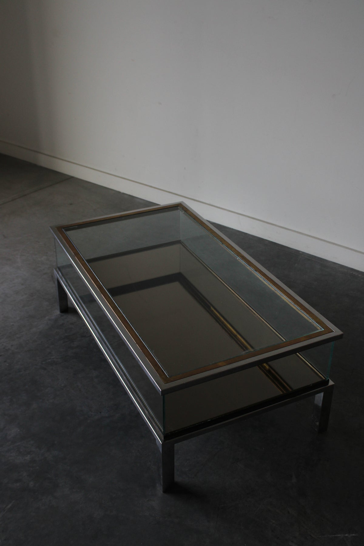 Brass and Chrome Sliding Top Coffee Table in by Maison Jansen